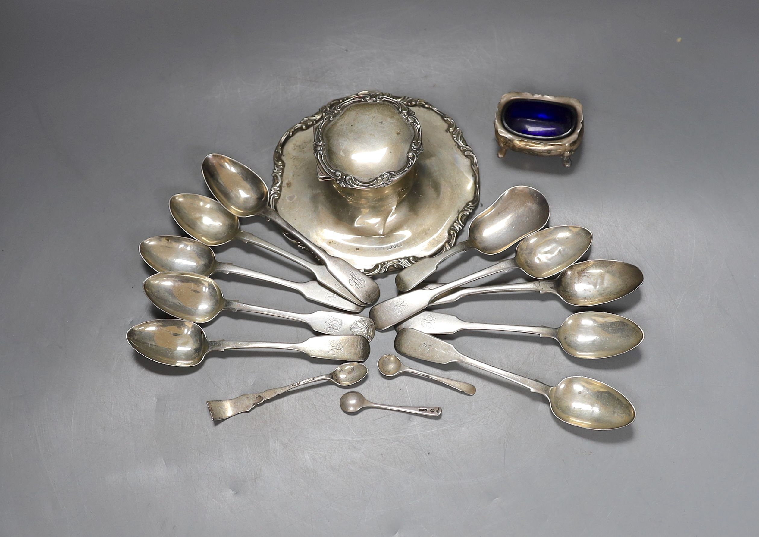 An early 20th century silver mounted inkwell, a silver salt and a small group of silver cutlery including a set of six teaspoons, Thomas Sewell I, Newcastle, 1875